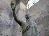 A bronze statue of a Roman magistrate in a toga, known at the _Arringatore_. From the 2nd century BC, Perugia